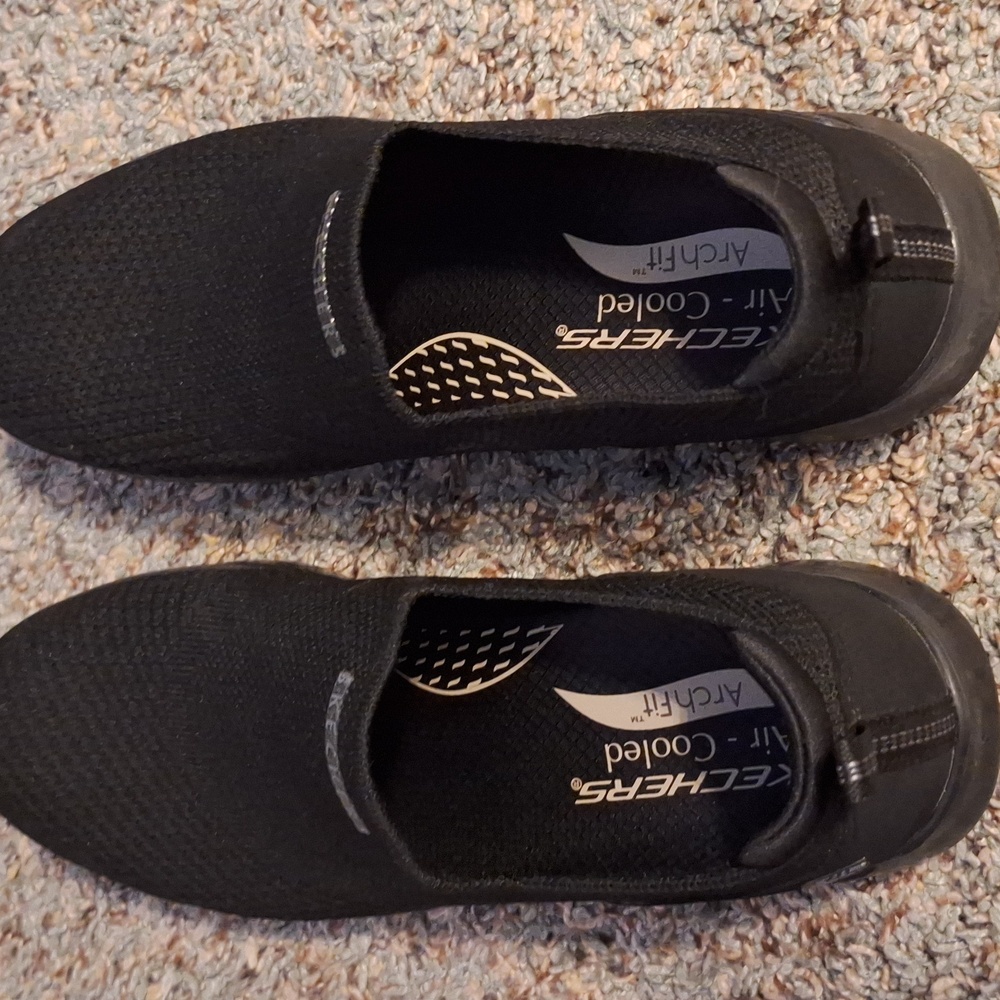 Skechers black slip on shoes